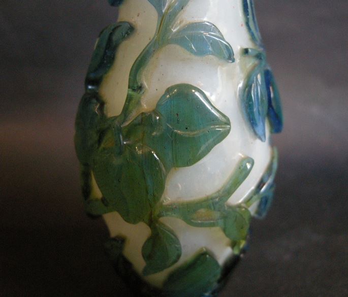 Small vase overlay glass turquoise blue, green on ground white opaque decorated with longevity peach and foliage | MasterArt